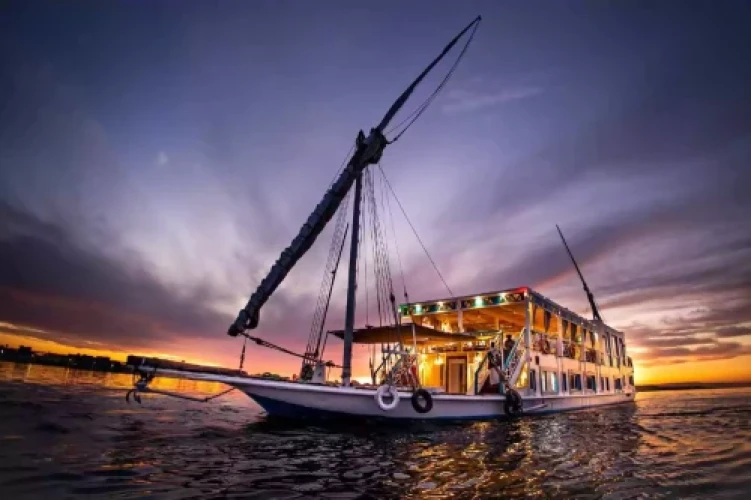 Elegant luxury Dahabiya cruise boat sailing on the Nile River
