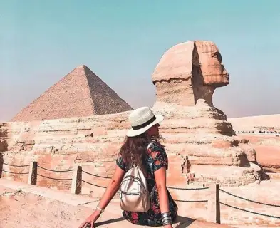 Giza Pyramids Tour with Felucca Ride featuring the Great Sphinx of Giza near the pyramids in Egypt