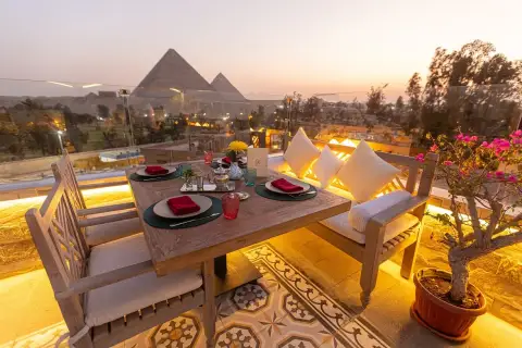 Best Cairo Day Tour enjoying pyramid view dinner near the Great Pyramids of Giza
