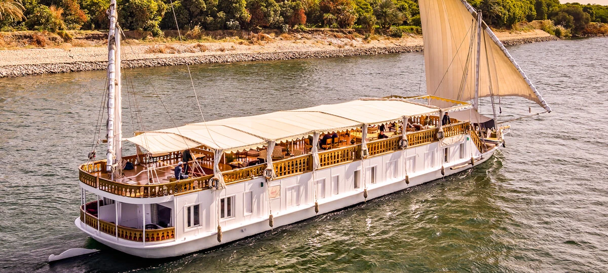 Luxury Dahabiya Nile Cruise sailing along the Nile River in Egypt