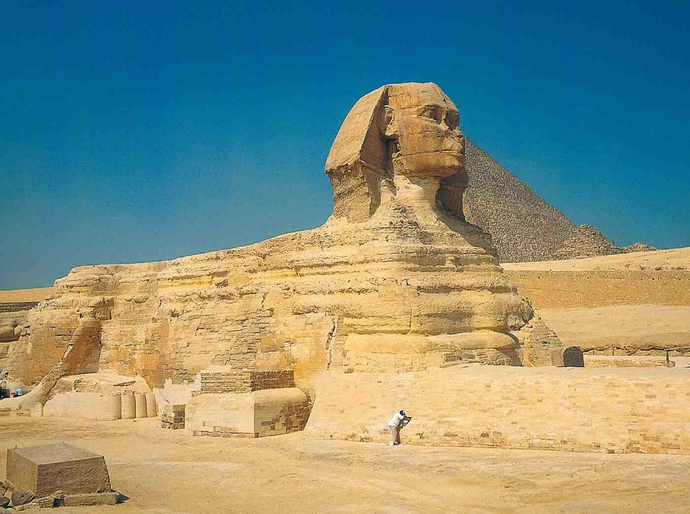 Iconic Sphinx of Giza with the Great Pyramids in the background