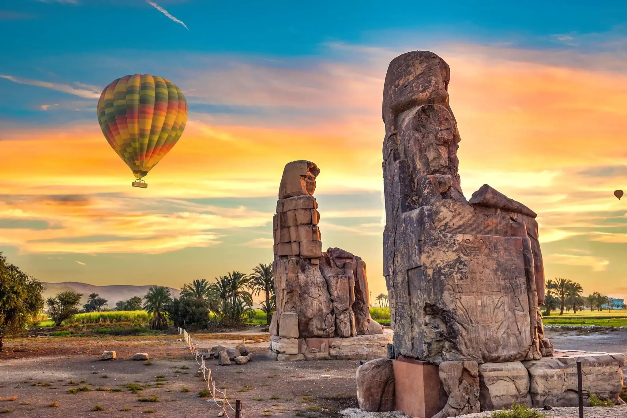 Colossi of Memnon ancient statues overlooking Luxor