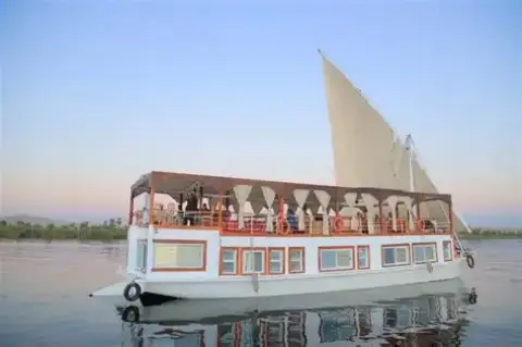 Queen Nefer Dahabiya Cruise sailing along the Nile River