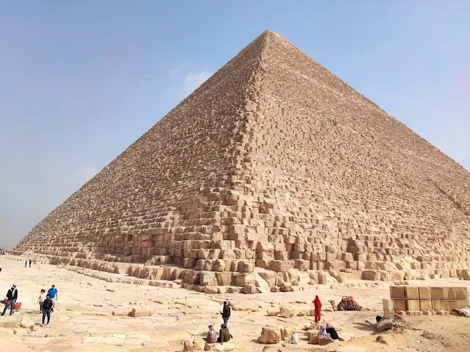 Family tours visiting the Great Pyramid of Giza in Egypt