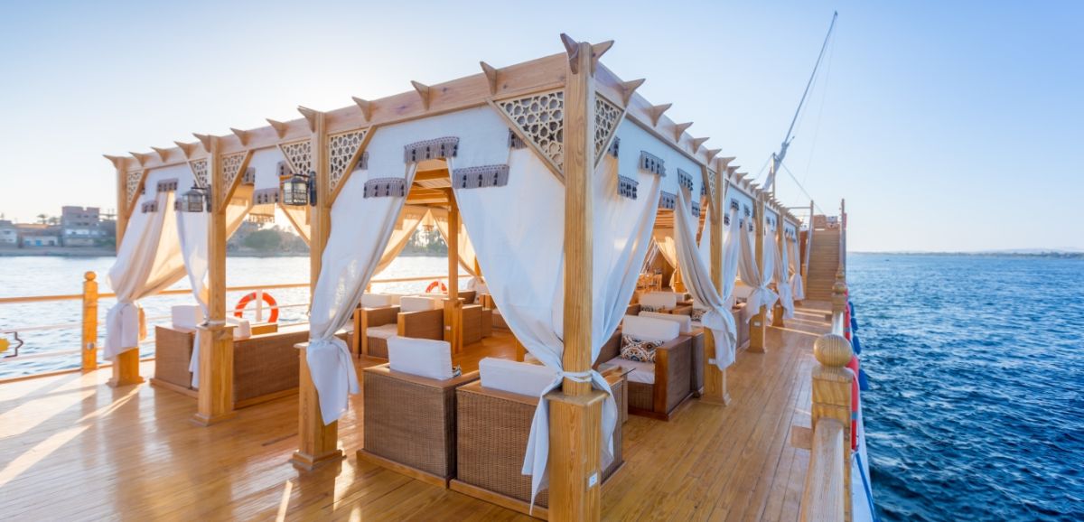 Picture of small boats sailing on the Nile River in wonderful sunny weather